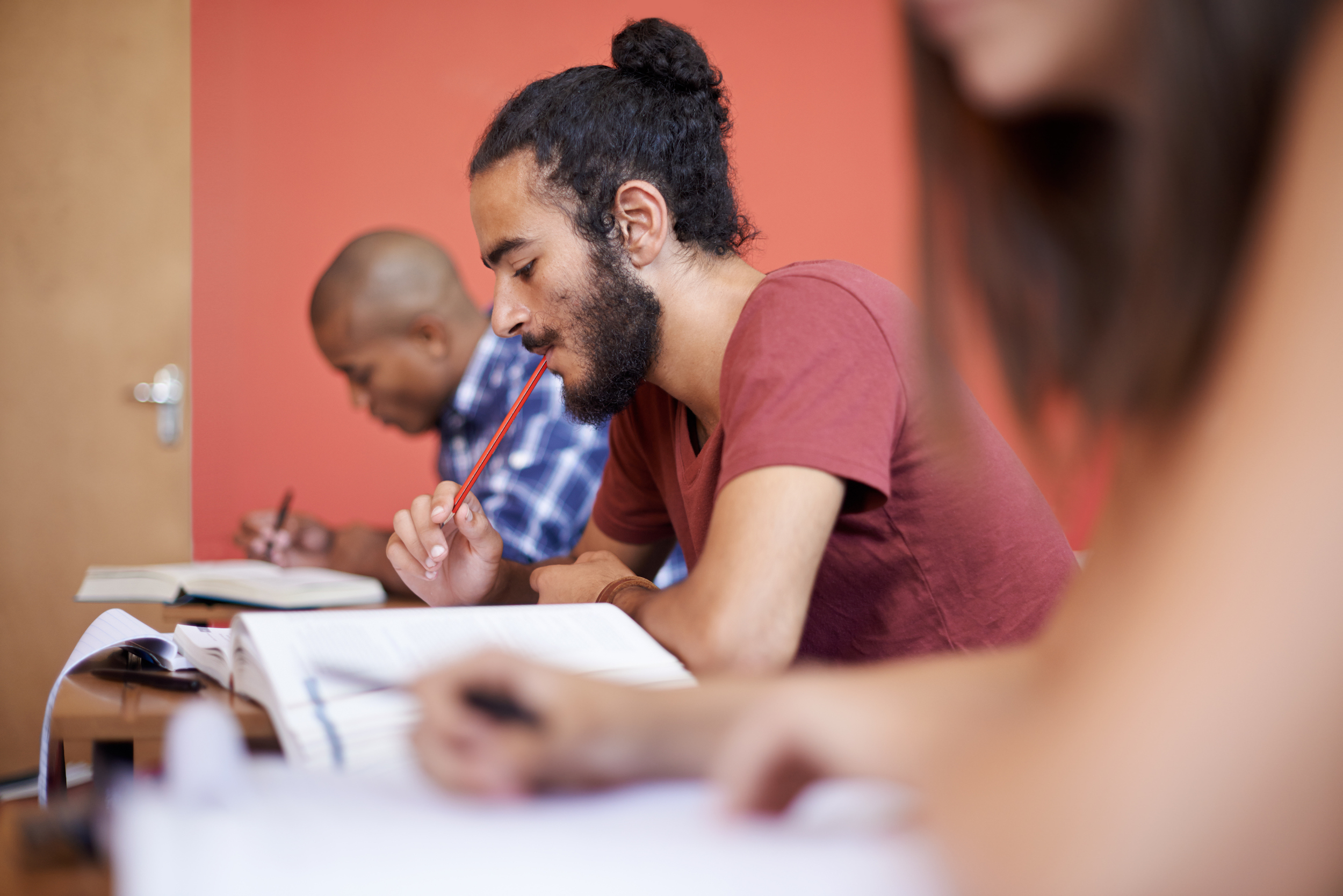 man taking exam in classroom