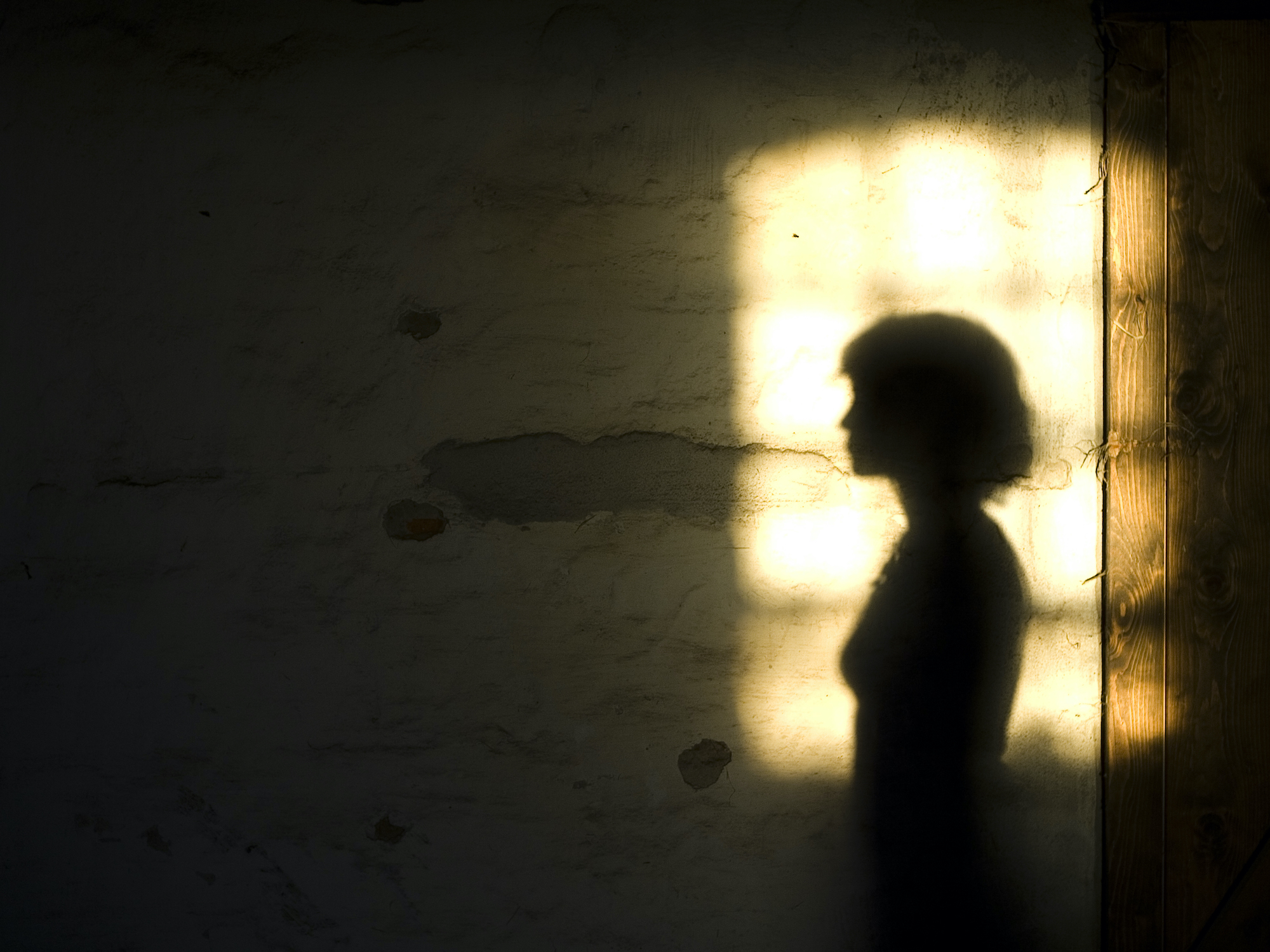 shadow of woman in doorway