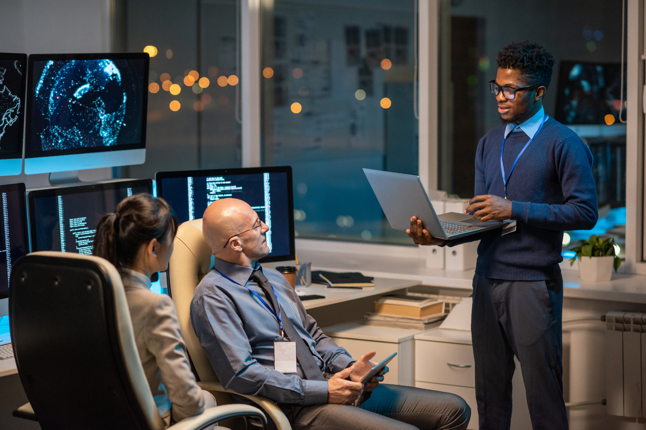 professionals in a computer room