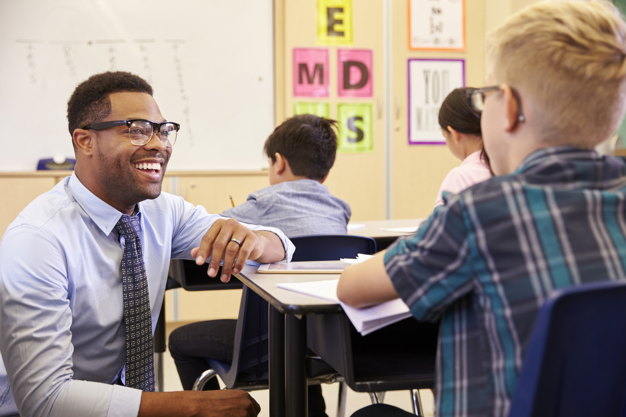 teacher talking to student