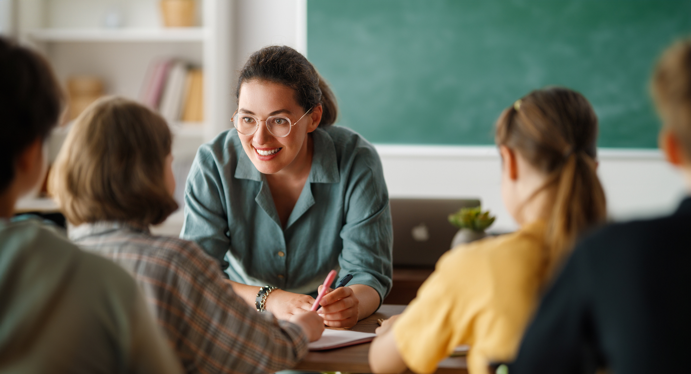 teacher talking to students