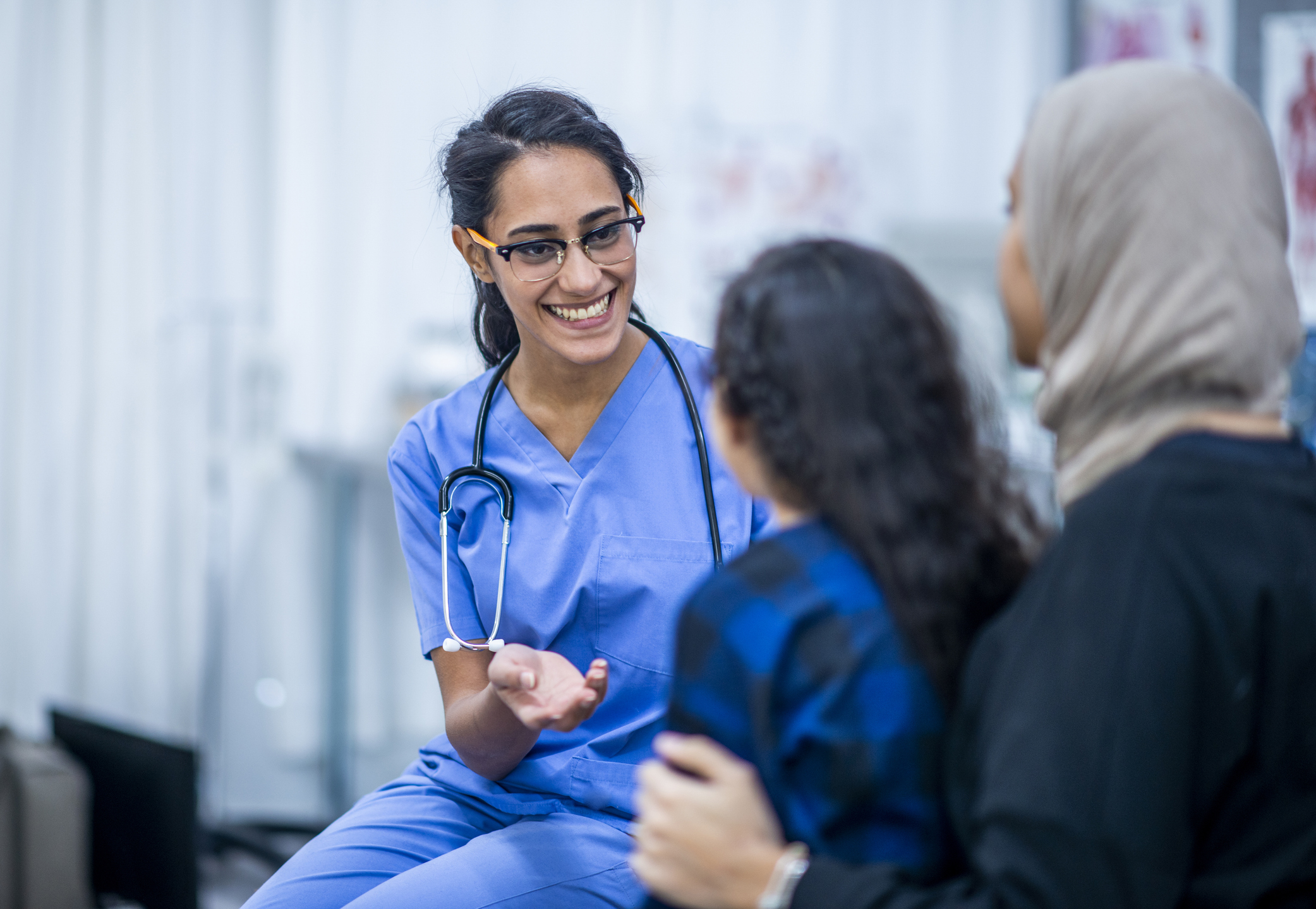 Nurse talking to patients