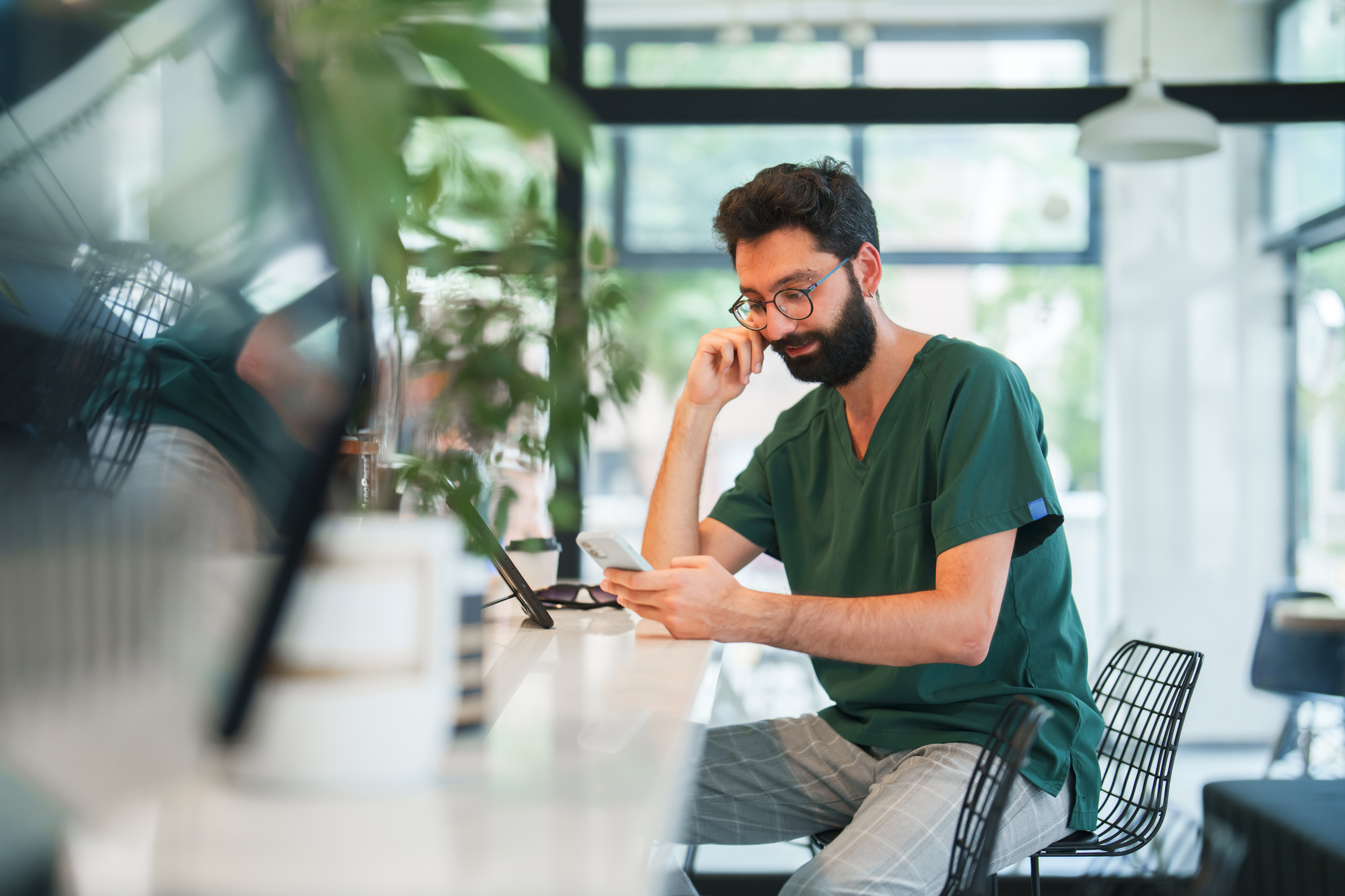 man looking at cell phone