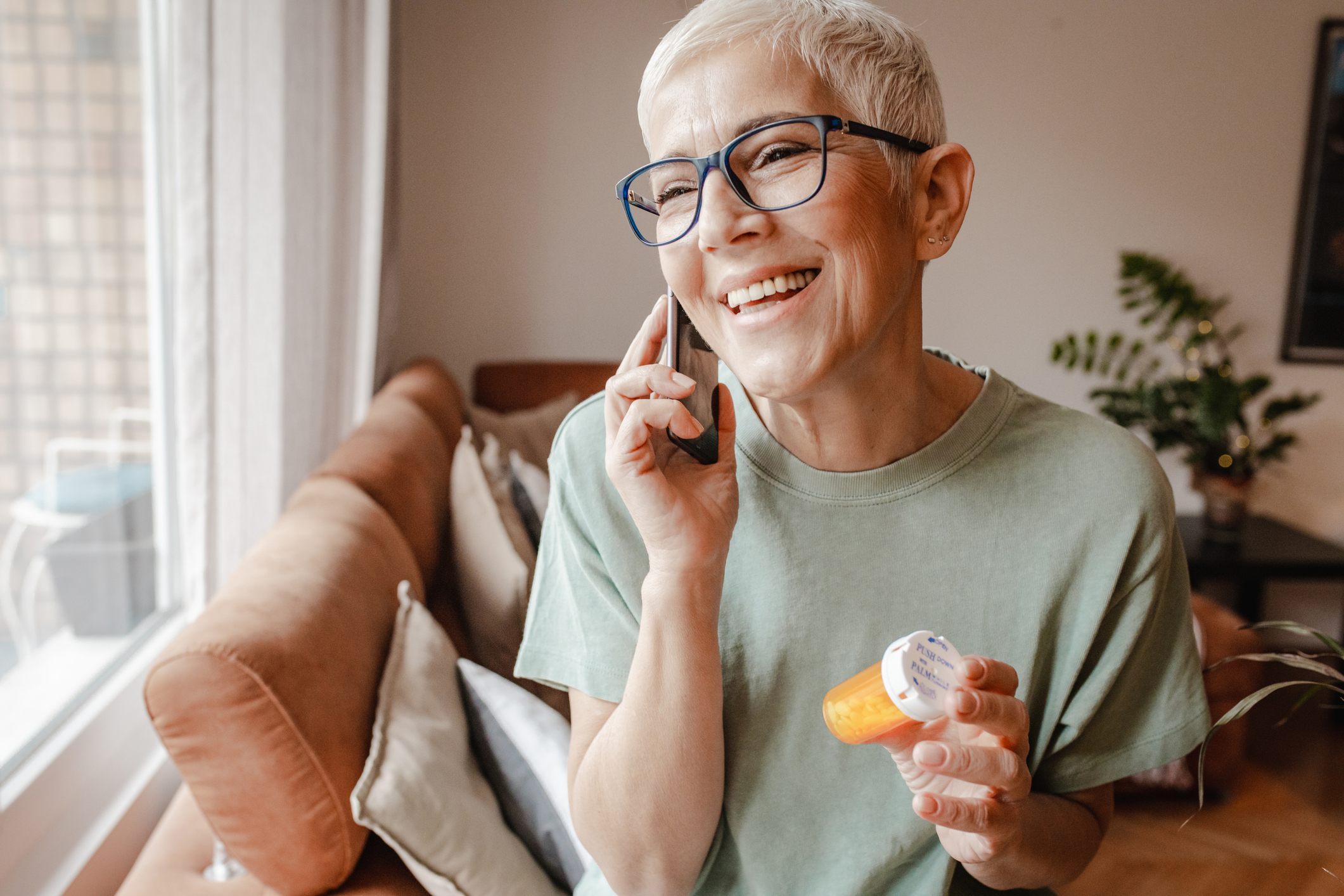 Woman talking on cell phone and smiling