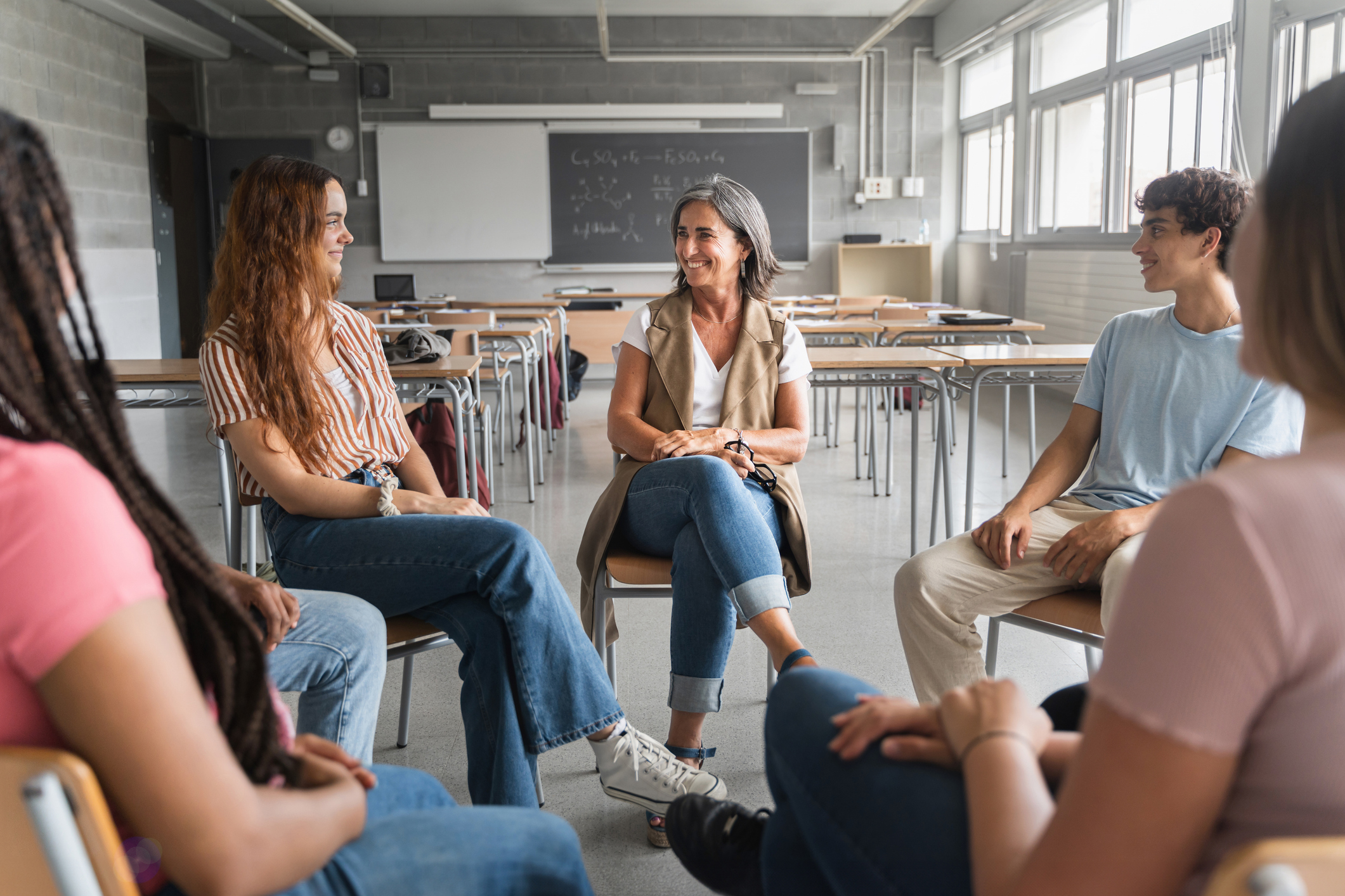 counselor in group talking